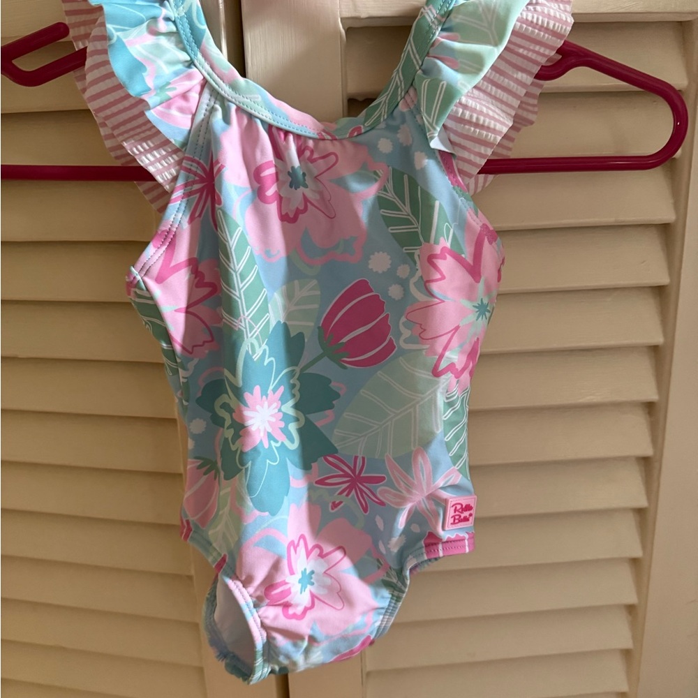 NWT Ruffle Butts V-Back One Piece Ruffle Sleeve Floral Swimsuit "In Bloom"